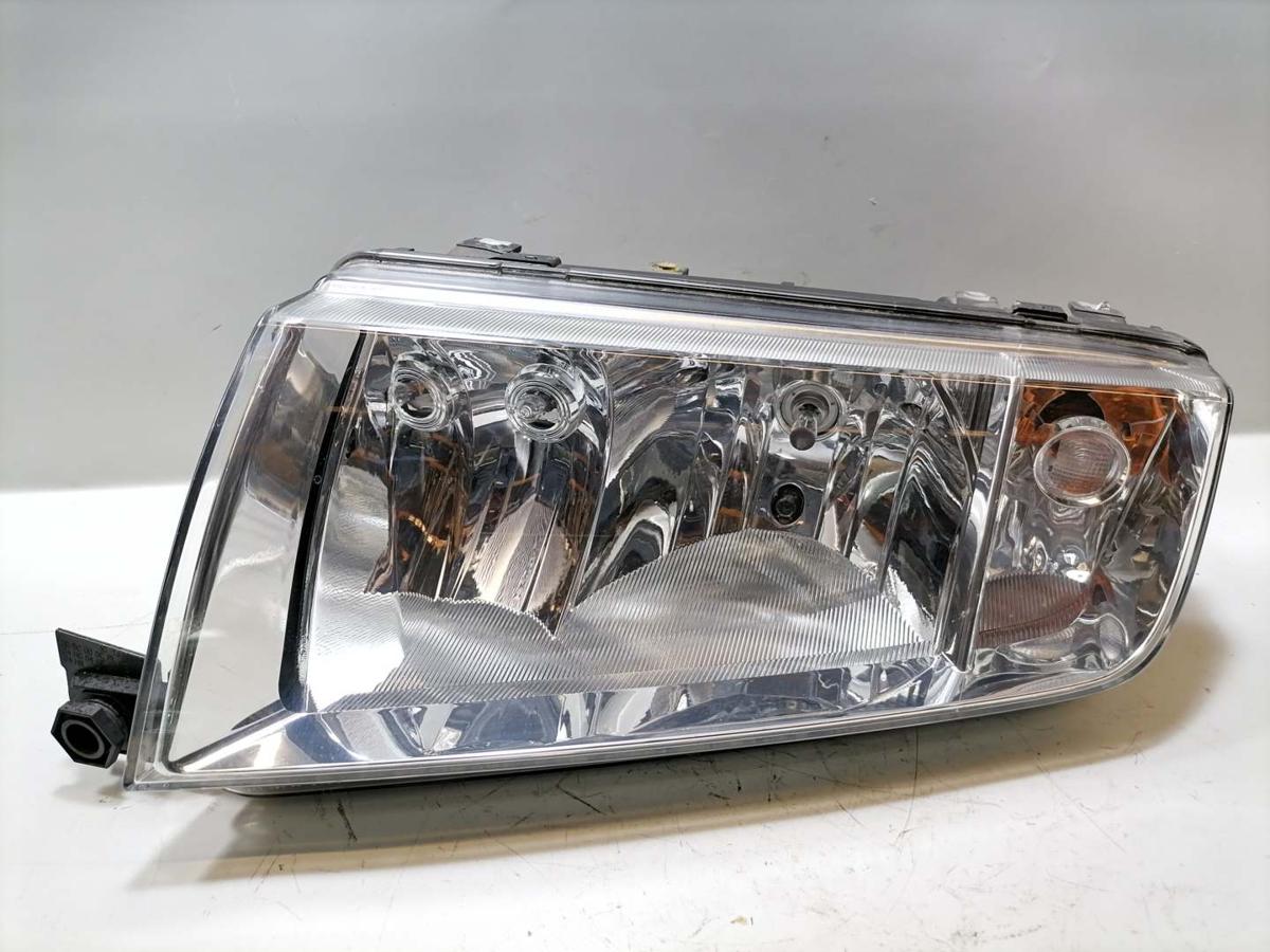 Skoda Fabia 6Y original Scheinwerfer links Halogen Chromhintergrund Bj.2005